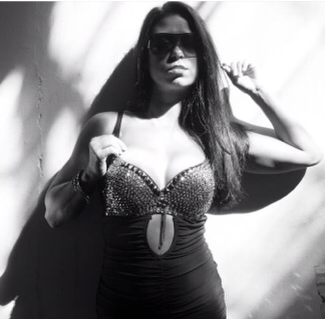Natalie Nicole in a black-and-white fashion photograph